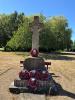 WW1 & WW2 memorial stone celtic cross on Apperley village green