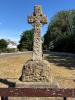 WW1 & WW2 memorial stone celtic cross on Apperley village green