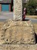 Names on WW1 & WW2 memorial stone celtic cross on Apperley village green