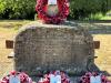 Names on WW1 & WW2 memorial stone celtic cross on Apperley village green