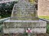Dedication inscribed in lead lettering on pedestal