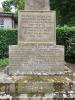 Inscription on base of cross