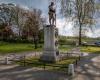 Figure of serviceman on pedestal