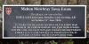 East wall parapet plaque