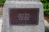 Plaque on left side of memorial