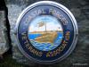 H.M.S. ST. CHRISTOPHER Commemorative Cairn at the Highland Hotel - Badge