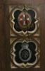 Panel 2- Queen Alexandra's Imperial Military Nursing Service-badges on outside of door