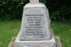 Inscription on base of 9 O'Clock side