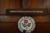 The metal name strip, and the regimental marker