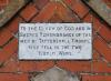 Commemorative tablet at apex of arch