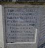 A view of the face of the memorial cross showing the first group of names from WW1