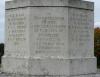 A view of the front base of the cross showing the dedication and at each side names of those who died in WW2 Danbury Essex