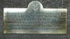 A close view of the brass plaque , associated with the stained glass window on  the north  wall of Salisbury Cathedral  Wilts