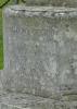 A close view of the face of the base of the Cross of Remembrance containing the Dedication Great Waltham Essex