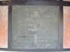 The commemorative plaque at the rear of the memorial