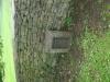 The Stone and Plaque at the rear of the memorial Cross