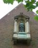 Bronze figure North wall exterior War Memorial Hall