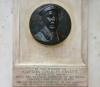 Marble tablet with bronze relief of Captain Fryatt with close up of inscription