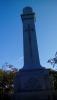 Detail of the carved wreath, of the cross on the obelisk and the incised cross at the very top of the obelisk