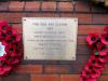 Commemorative plaque at carved pediment from Sandy Row Brewery