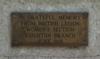 Brass plaque on flower vases, front