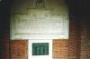 WW1 Dedication tablet and WW2 plaque, within central arch (i.e. arch 6)
