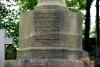 The inscription on the base of the cross