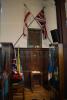 The memorials area - the WW1 plaque is between the crossed flags