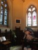 The side chapel, showing the Memorial on the corner wall between the windows
