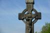 Latin inscription on the wheel of the cross