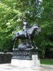 Bronze statue on marble pedestal depicting St George on his horse