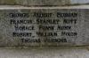 Memorial names on base
