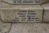 Memorial names on base