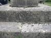 Inscription on stepped base