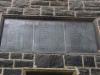 Plaque with names list over window
