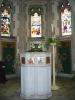 Pale stone baptismal basin.