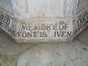 Close up of part of the inscription at the bottom of a stone baptismal basin.