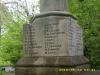 Inscription on plinth (9 o'clock face)