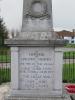 Inscription on plinth (6 o'clock face)