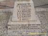 Inscription on plinth (6 o'clock face)