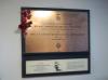 The brass plaque and the later Citation in the entrance hall of the flats