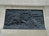 Feature carved on plinth
