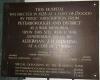 Top section of bronze plaque (while in temporary storage)